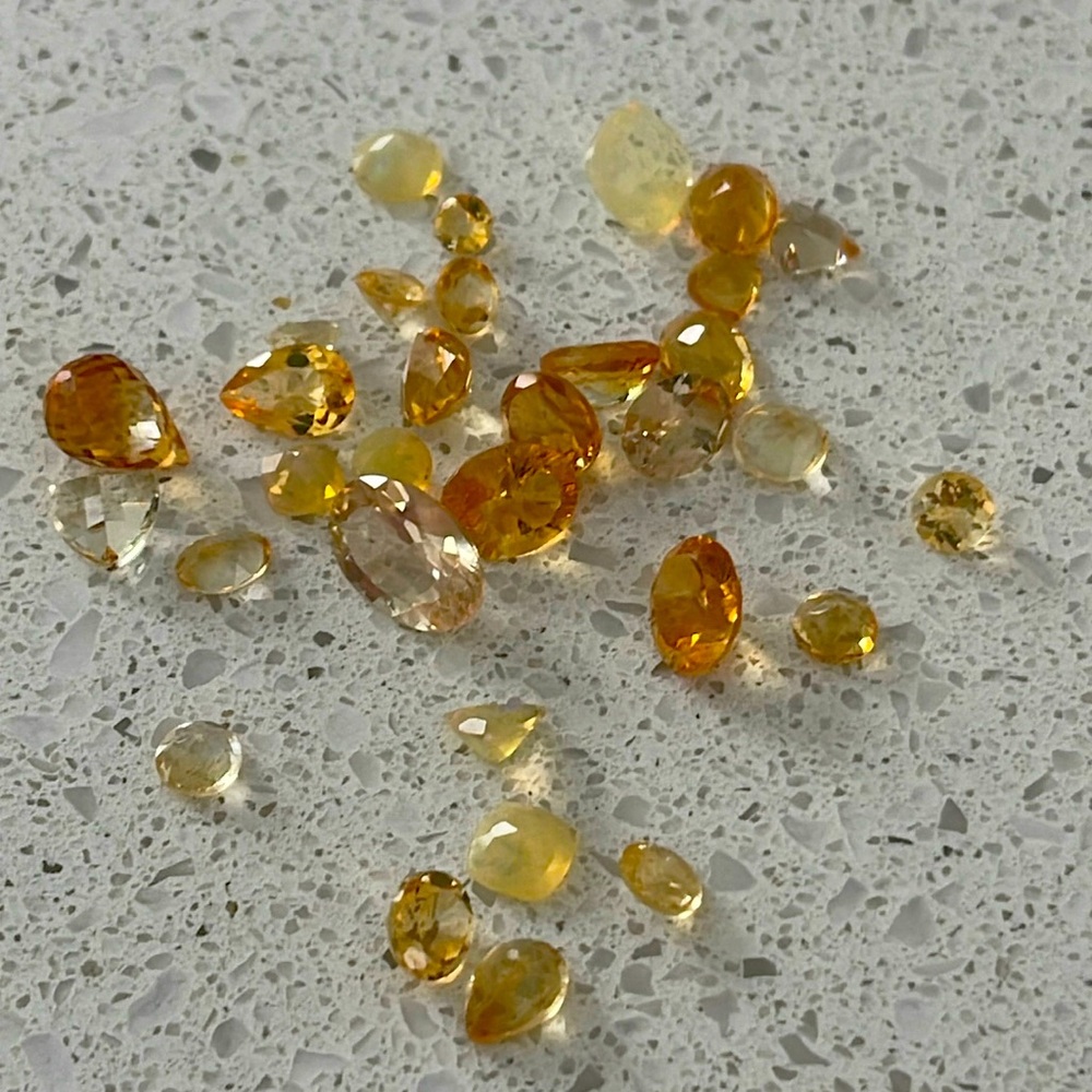 Beautiful lot of 30 heat treated citrine and topaz gemstones